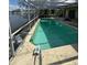 Relaxing pool with screened enclosure at 6396 18Th Ne St, St Petersburg, FL 33702