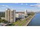 Aerial view showcasing the condominium complex, waterfront access, and nearby cityscape at 2413 Bayshore Blvd # 1404, Tampa, FL 33629