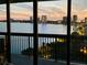Stunning balcony view overlooking a tranquil lake and city skyline at sunset at 2413 Bayshore Blvd # 1404, Tampa, FL 33629