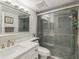 Modern bathroom features a sleek vanity, glass-enclosed shower, and updated fixtures at 2413 Bayshore Blvd # 1404, Tampa, FL 33629