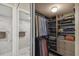 A well-organized closet and bathroom suite, maximizing space and functionality at 2413 Bayshore Blvd # 1404, Tampa, FL 33629
