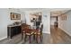 Open dining area with wood floors, bar, and view of the kitchen offers an inviting space at 2413 Bayshore Blvd # 1404, Tampa, FL 33629