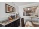 Dining area featuring a view of the adjacent kitchen, showcasing granite counters and a passthrough at 2413 Bayshore Blvd # 1404, Tampa, FL 33629