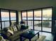 Living room with water view from large windows at 2413 Bayshore Blvd # 1404, Tampa, FL 33629