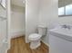 Clean bathroom with white vanity, toilet, and bathtub at 8381 Chelsea Ct, North Port, FL 34287