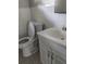 Clean bathroom with white tile and vanity at 3023 W Green St, Tampa, FL 33607