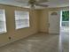 Living Room with tile floors and ceiling fan at 3023 W Green St, Tampa, FL 33607