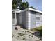 House exterior with gray siding and white trim at 3023 W Green St, Tampa, FL 33607