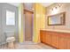 Clean bathroom with shower, vanity, and mirror at 2443 Waterfall Dr, Spring Hill, FL 34608