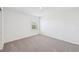 Bedroom featuring neutral carpet and ample natural light at 14044 Crutchfield Ct, Parrish, FL 34219