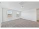 Bright bedroom with neutral carpet and view of neighborhood at 14044 Crutchfield Ct, Parrish, FL 34219
