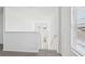 Bright stairwell with natural light and neutral carpet at 14044 Crutchfield Ct, Parrish, FL 34219