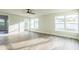 Spacious living area with hardwood floors and ample natural light at 1845 Skyland Dr, Clearwater, FL 33759
