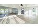 Open concept living room with kitchen view at 1845 Skyland Dr, Clearwater, FL 33759