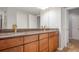 Double vanity bathroom with granite countertops at 1810 E Palm Ave # 1205, Tampa, FL 33605
