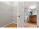 Bathroom with tiled floor, toilet, and a walk-in closet at 1810 E Palm Ave # 1205, Tampa, FL 33605