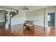 Spacious living room with hardwood floors and a ceiling fan at 612 Marion Hill Ln, Ruskin, FL 33570