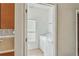 Convenient laundry room with washer, dryer, and overhead shelving at 612 Marion Hill Ln, Ruskin, FL 33570