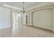 Bright dining room with tiled floors and chandelier at 612 Marion Hill Ln, Ruskin, FL 33570