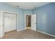 Bright bedroom with ample closet space and neutral walls at 612 Marion Hill Ln, Ruskin, FL 33570