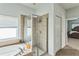 Bathroom features a shower, bathtub, and updated fixtures at 612 Marion Hill Ln, Ruskin, FL 33570