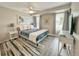 Bright bedroom with a king-size bed and large windows at 3310 W 63Rd W St, Bradenton, FL 34209