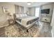 Main bedroom with king-size bed, plenty of light and TV at 3310 W 63Rd W St, Bradenton, FL 34209