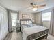 Spacious bedroom with a comfortable bed and large windows at 3310 W 63Rd W St, Bradenton, FL 34209