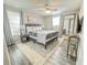 Spacious bedroom with king bed, nightstands and large mirror at 3310 W 63Rd W St, Bradenton, FL 34209