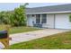 Cozy ranch home with two-car garage and small front yard at 3310 W 63Rd W St, Bradenton, FL 34209