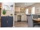 Modern kitchen with white cabinets and stainless steel appliances at 3310 W 63Rd W St, Bradenton, FL 34209