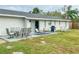 Spacious patio with seating area and grill at 3310 W 63Rd W St, Bradenton, FL 34209