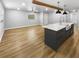 Modern kitchen with island and stainless steel appliances at 736 Mac Crillus Rd, Largo, FL 33770