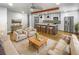 Open concept living room and kitchen with modern design at 736 Mac Crillus Rd, Largo, FL 33770