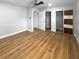 Bright bedroom with double door closet and wood floors at 736 Mac Crillus Rd, Largo, FL 33770