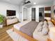 Spacious bedroom with walk-in closet and wood floors at 736 Mac Crillus Rd, Largo, FL 33770