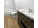 Updated bathroom with new vanity, toilet, and bathtub at 736 Mac Crillus Rd, Largo, FL 33770
