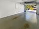 Spacious garage with open door, showing a view of the driveway at 736 Mac Crillus Rd, Largo, FL 33770