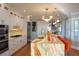 Modern kitchen featuring a large center island with seating and a unique backsplash at 2041 Beach Dr Se, St Petersburg, FL 33705