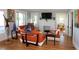 Cozy living room with fireplace, hardwood floors, and views to the backyard at 2041 Beach Dr Se, St Petersburg, FL 33705