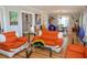 Bright living room with hardwood floors, stylish furniture, and modern art at 2041 Beach Dr Se, St Petersburg, FL 33705