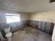 Bathroom needing renovation, with toilet and tiled floor at 4945 Docner St, New Port Richey, FL 34652