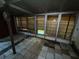Enclosed patio with tiled floor and window coverings at 9431 Pontiac St, New Port Richey, FL 34654