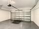 Garage with automatic door opener and epoxy floor at 1543 Mackinaw St, North Port, FL 34286