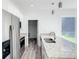 Open concept kitchen with island and stainless steel appliances at 1543 Mackinaw St, North Port, FL 34286