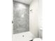 Walk-in shower with gray marble tile at 1543 Mackinaw St, North Port, FL 34286