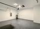 Garage with automatic door opener and storage at 1543 Mackinaw St, North Port, FL 34286