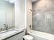Bathroom with granite countertop and bathtub at 1543 Mackinaw St, North Port, FL 34286