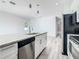 Modern kitchen with granite countertops and stainless steel appliances at 1543 Mackinaw St, North Port, FL 34286