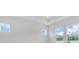 Bright bedroom with windows providing natural light and serene views at 2515 Wise River Lane, Zephyrhills, FL 33539